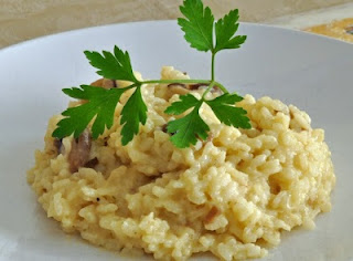 Risotto combinado con hongos, bacón y zucchinis