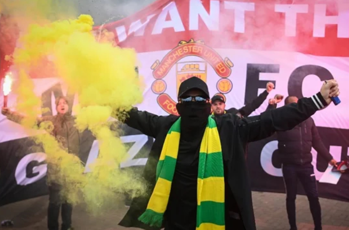 English Premier League match postponed after protesting fans storm field