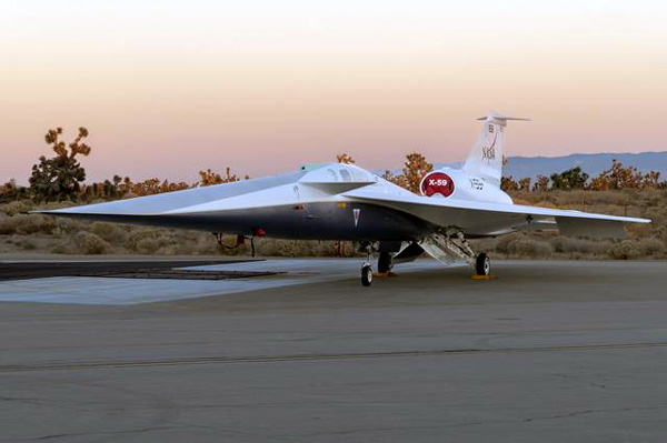 NASA's X-59 QueSST aircraft sits on the ramp at Lockheed Martin Skunk Works in Palmdale, California...during sunrise on December 12, 2023.