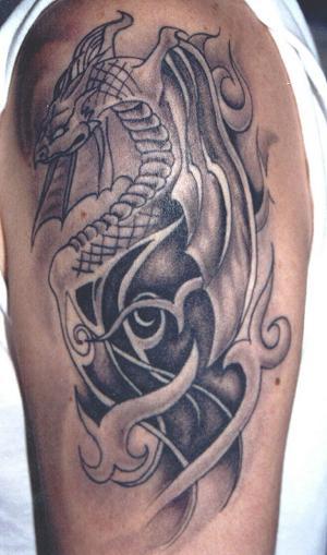 black and gray tattoo. Upper Back Tattoo Designs