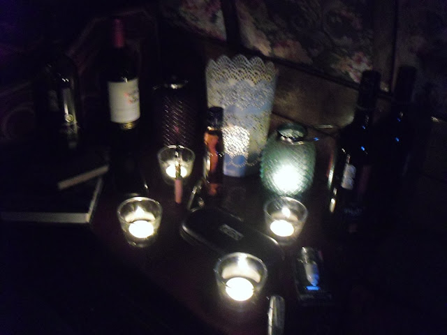 Lots of candles and wine