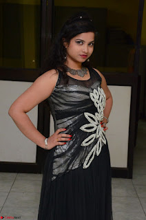 Shrisha Dasari in Sleeveless Short Black Dress At Follow Follow U Audio Launch 013.JPG