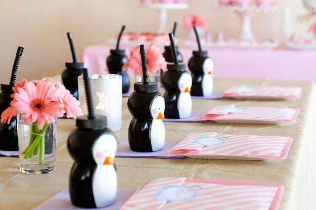 I included tiny vases of pink gerbera daisies along the table