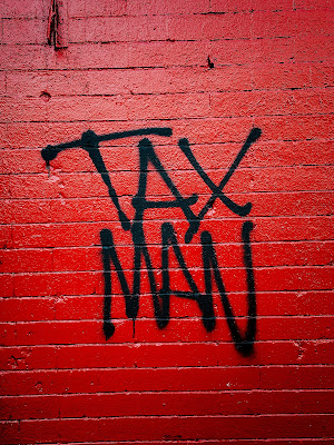 Tax Man by Jon Tyson via Unsplash - https://unsplash.com/photos/nPncMJ3zEUY