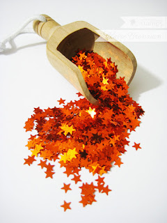 http://www.waltzingmousestamps.com/collections/new/products/orange-metallic-star-sequins#content