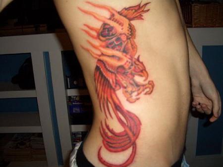 Phoenix Arm Tattoos Beautiful phoenix free tattoo design 