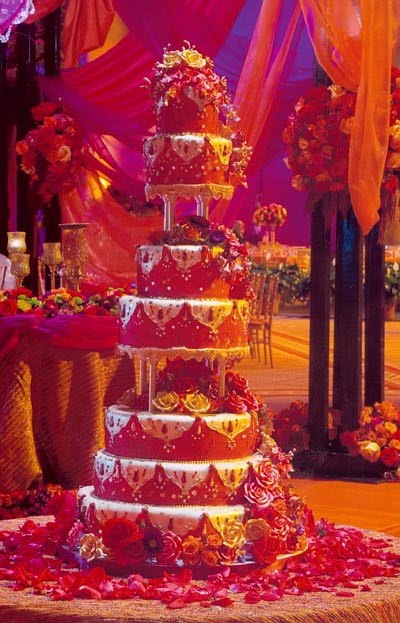 Indian Wedding Cake Decorated With Mahndi And Elephants Topper