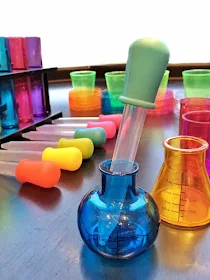 plastic potion bottles and pipettes