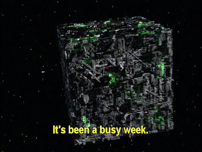 Star Trek still of a Borg cube floating in space. Caption says, "It's been a busy week."