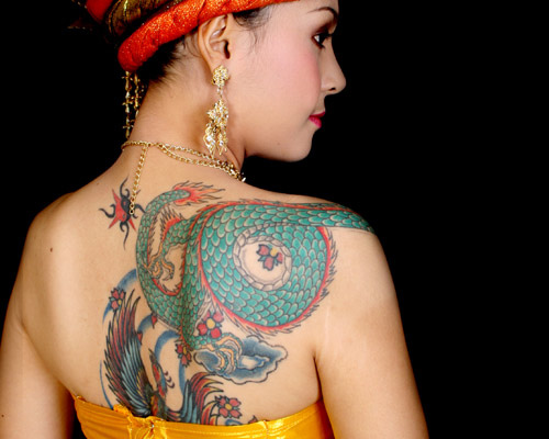girl with tattoo. girl with tattoo.