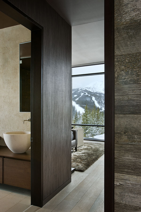 Wooden wall decor in Elegant Mountain Home by Reid Smith Architects