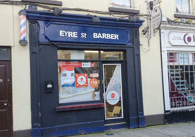 crooked signwriting for Eyre Street Barber shop