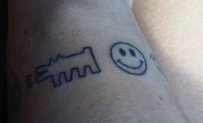 Lily Allen Smiley Face Tattoos