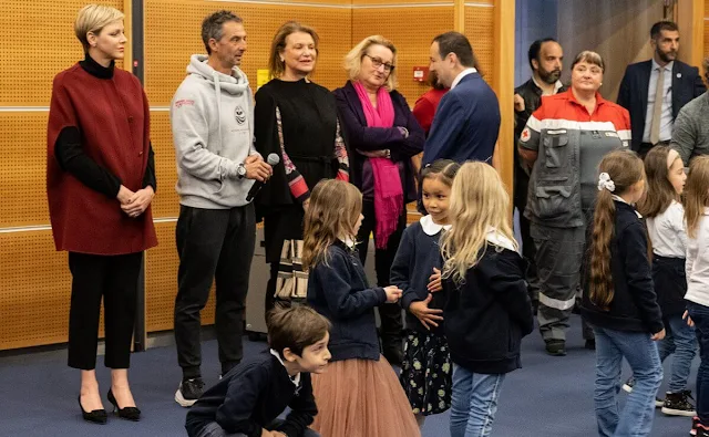 Princess Charlene wore a wine red Oriana structured wool cape coat by Akris, Loro Piana cashmere cape coat