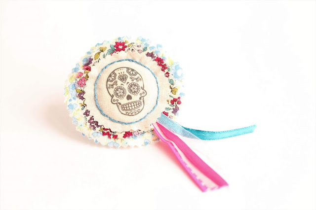 calavera brooch