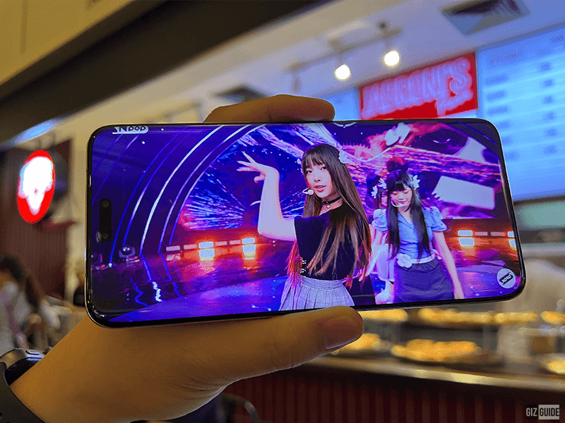 HONOR Magic6 Pro's curved OLED screen displaying Hyein of NewJeans