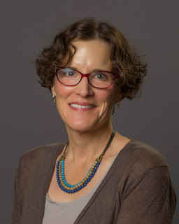 This image shows a picture of Christie Manning, recipient of the Macalester Sustainability Award for Curricular Innovation