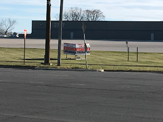 big building with empty parking lot