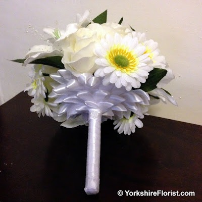  White bridal bouquet lilies roses gerbera and pearls