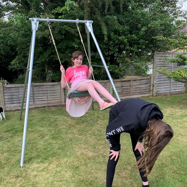 stephs two girls on swing in garden