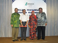 Long service award being presented by guest of honor Tunku Imran