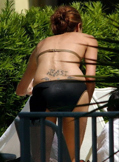 Angelina Jolie back poses Tattoo