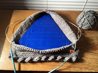 knitted base, cardboard support
