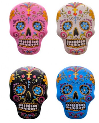 four sugar skull magnets