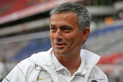 New Inter boss Jose Mourinho is all smiles during Inter's friendly against Sevilla in the Amsterdam tournament. Even a boring goalless draw could not wipe it off.