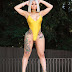 Blac Chyna Showcases Her Famous Curves As She Takes The Plunge In Brilliant Gold 