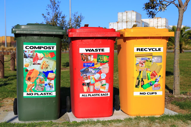 Brightly colored recycle bins at a school