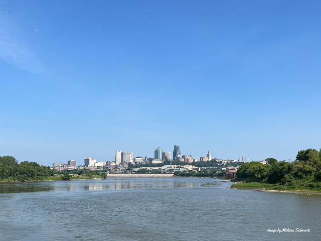 Spectacular view of Kansas City rising above the confluence of the Kansas and Missouri Rivers from Kaw Point Park.