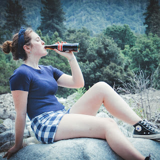 Woman drinking soda
