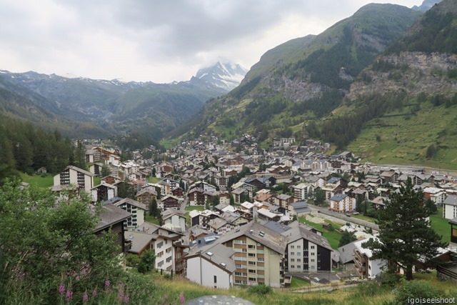 Good photo spot over Zermatt along Riedweg. View of Zermatt with the cloud-covered Matterhorn in the back.