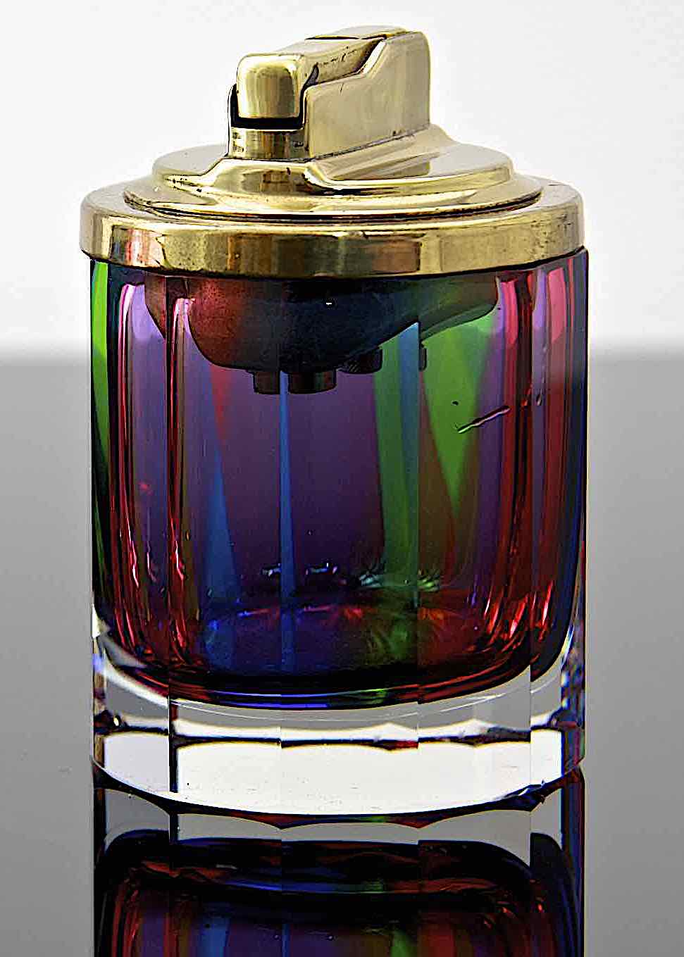 a 1970s glass cigarette lighter by Murano in a color photograph