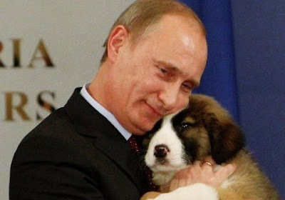 Vladimir Putin Cuddles With A Puppy Seen On  www.coolpicturegallery.us