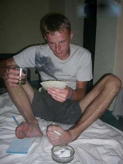 funny smoking photos holding cigarette bewtween toes and playing cards