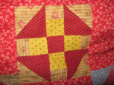 red and chrome yellow antique churndash quilt block