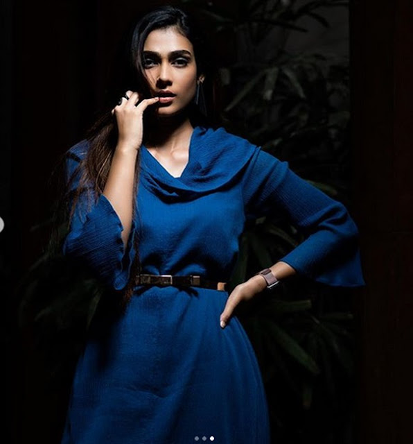 Telugu actress Aakanksha Singh radiates elegance in her latest photoshoot still, showcasing timeless beauty and style.