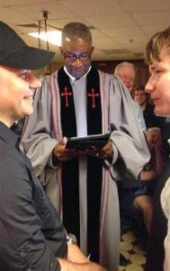 Rev. Wendell Griffen of New Millennium Baptist Church, performing one of many same-sex marriages in Little Rock 12 May 2014