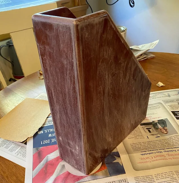 Photo of a wooden file bin with primer