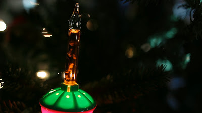 Christmas Bubble Light in a lit Pine Tree