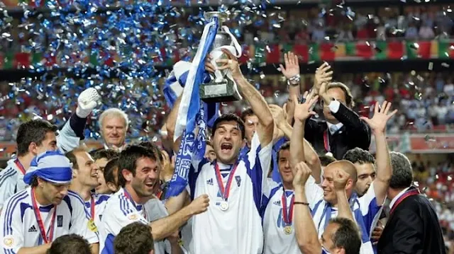 Greece celebrating their defensive masterclass victory at UEFA Euro 2004.