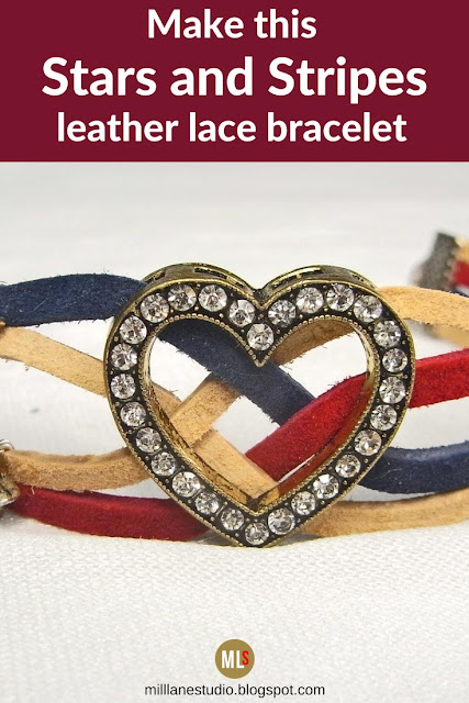 Patriotic leather lace bracelet in cranberry, sandy beach and cadet blue studded with silver star charms and featuring a crystal studded heart focal.