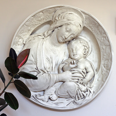 Large white plaster relief medallion of Madonna and Child