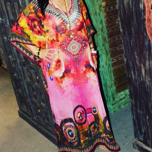 http://www.ebaystores.com/Mogulgallery/CAFTANS-/_i.html?_fsub=665713919&_sid=3781319&_trksid=p4634.c0.m322