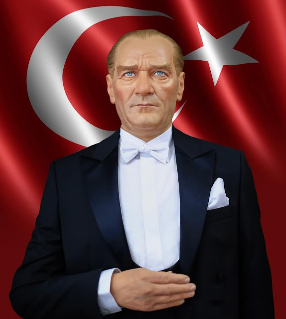 Mustafa Kemal Atatürk in front of Turkish flag