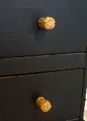 http://dollarstorecrafts.com/2011/03/make-recycled-champagne-cork-drawer-knobs/