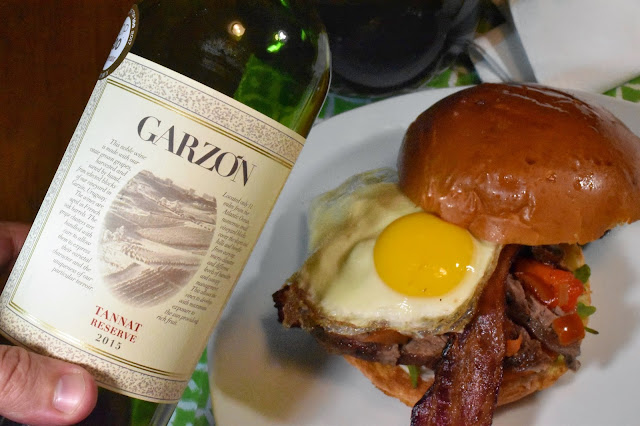 Bodega Garzón Tannat with a Chivito Sandwich.