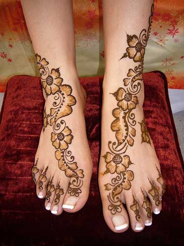 Flower foot tattoos
